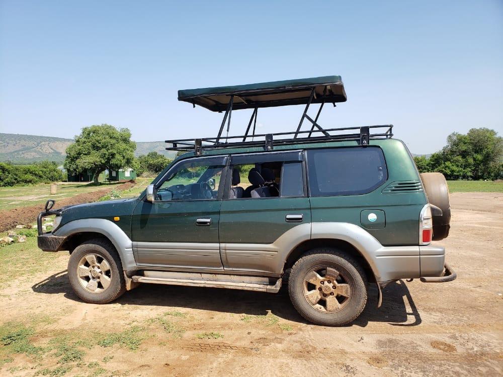 Land Cruiser Prado with a Pop Up roof hire in Uganda